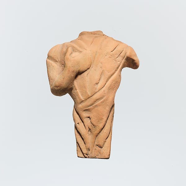 Terracotta statuette of a draped figure, probably female