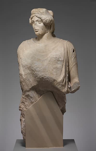 Upper part of a marble statue of a woman