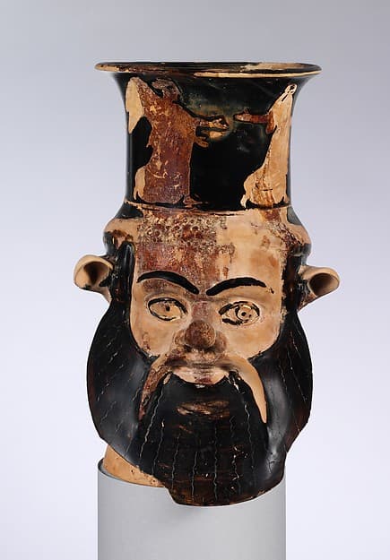 Terracotta mug in the form of a satyr's head, by Carlsruhe Painter