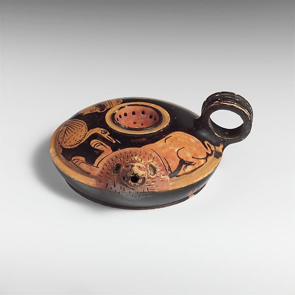 Terracotta strainer