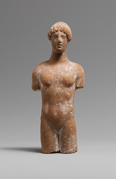 Terracotta head and torso of a woman
