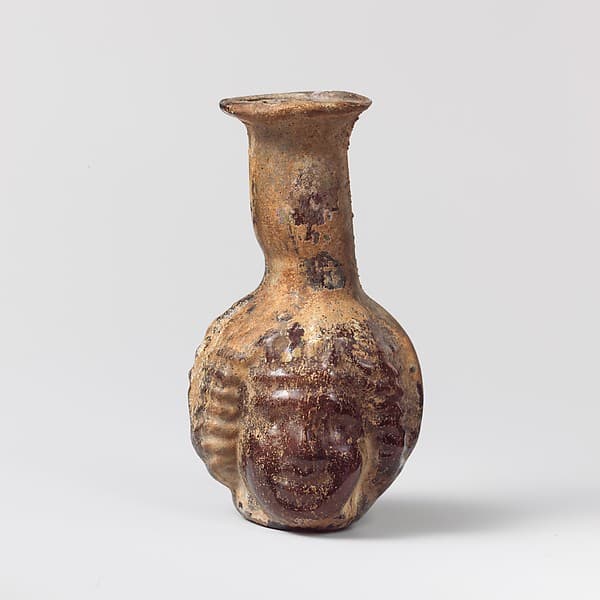 Glass double head-shaped bottle