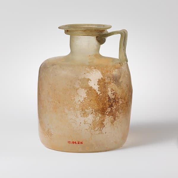 Glass one-handled bottle