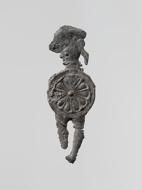 Lead figure of a warrior with a helmet and shield