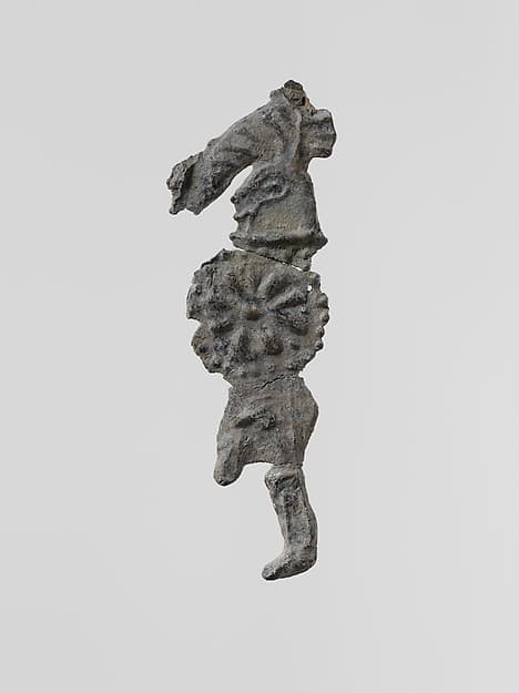 Lead figure of a warrior with a helmet and shield