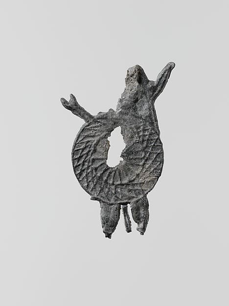 Lead figure of a warrior with spears and shield