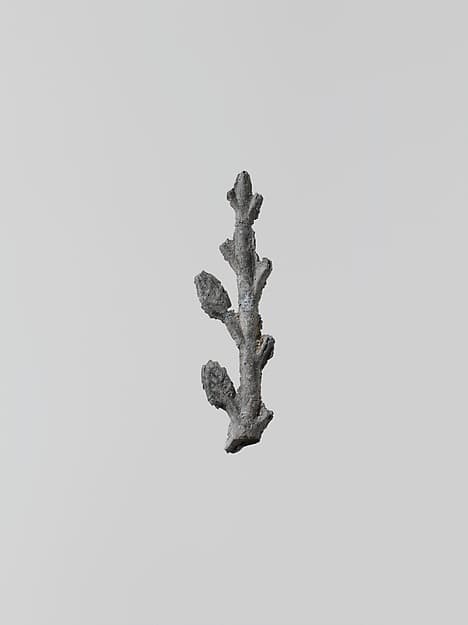 Lead ornament in the form of a branch