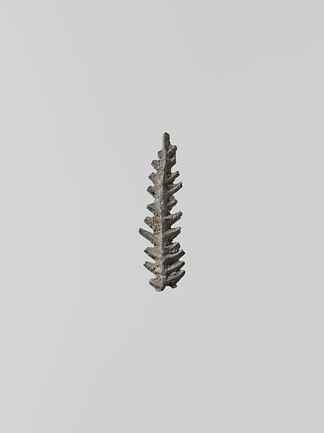 Lead ornament in the form of a branch