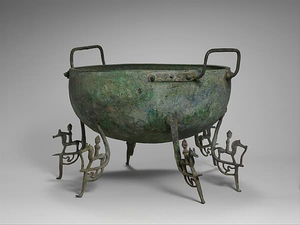 Bronze basin with six legs