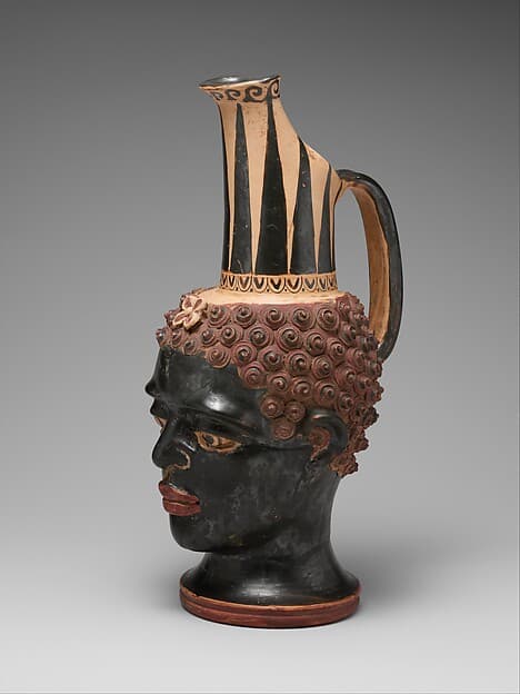 Terracotta vase in the form of a Black African youth's head, by Negro Boy Group