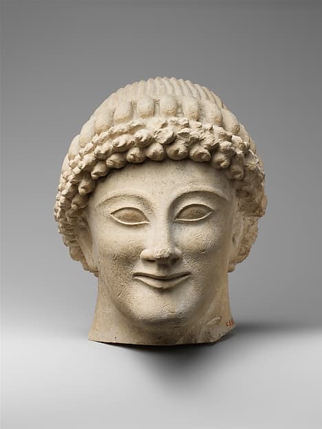 Limestone head of a youth
