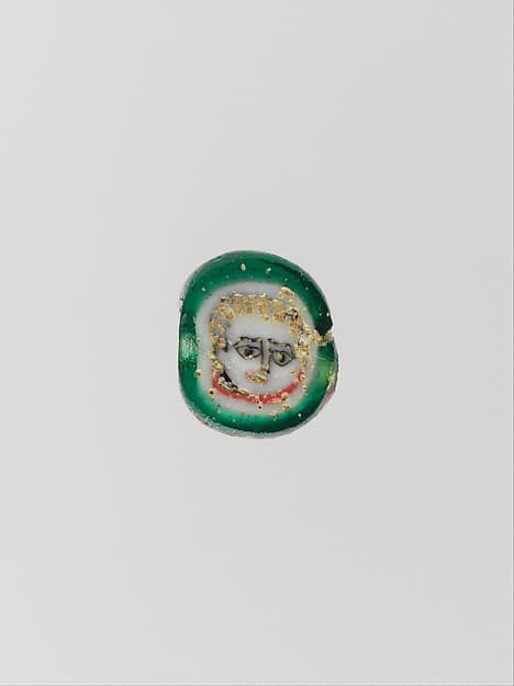 Glass mosaic face bead