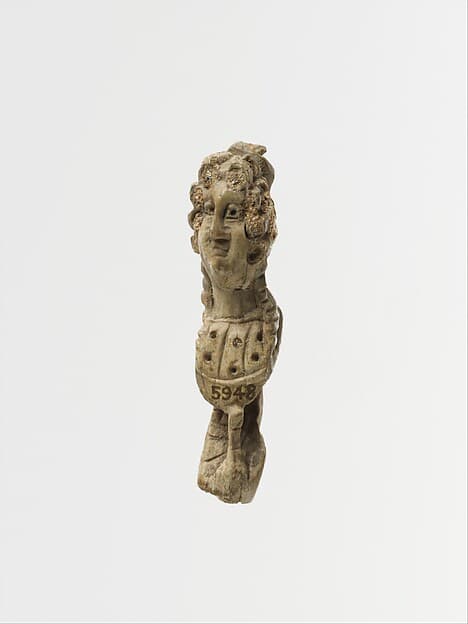 Bone pin head with female bust