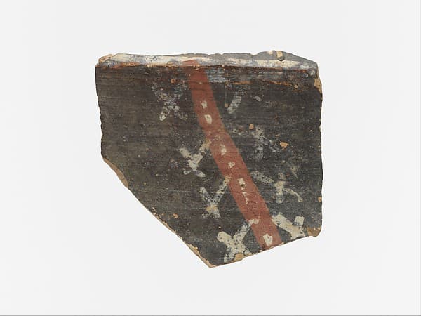 Terracotta rim of a cup with polychrome motifs