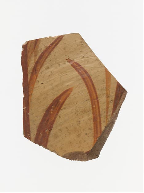 Terracotta vessel fragment with grass motif