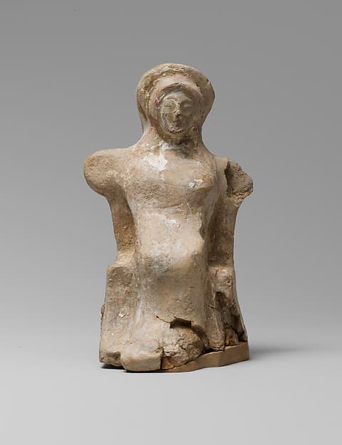 Terracotta statuette of a seated woman