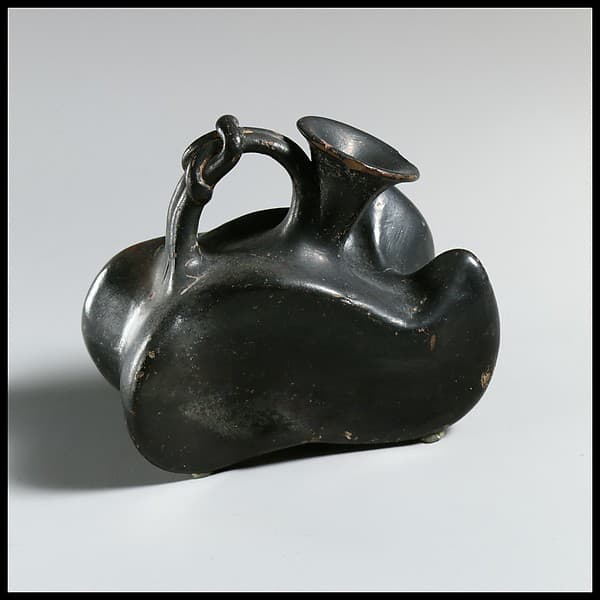 Terracotta askos (flask with a spout and handle over the top)