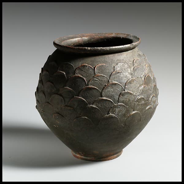 Terracotta jar with barbotine decoration
