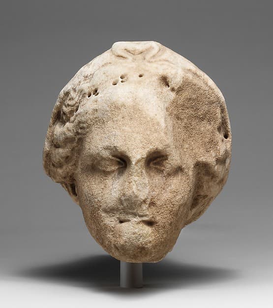 Marble head of a veiled goddess