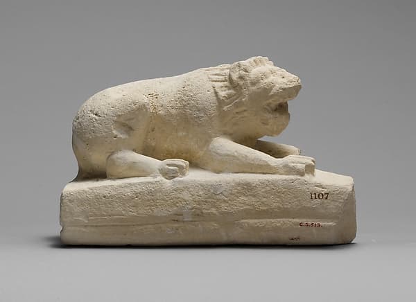 Limestone statuette of a lion