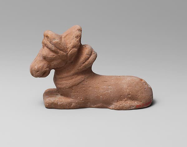 Terracotta figure of a kneeling horse