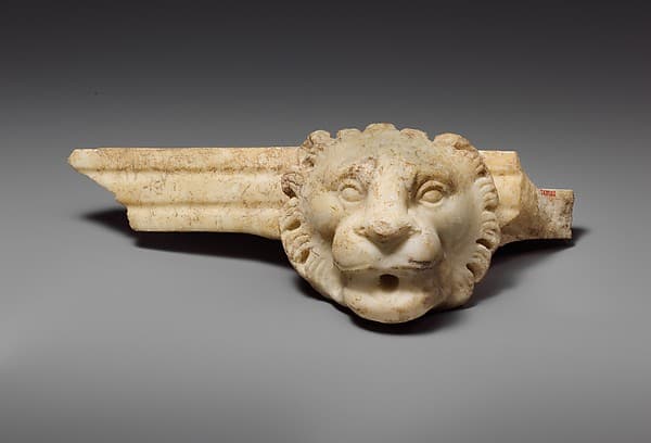 Marble fragment of a fountain with lion's head