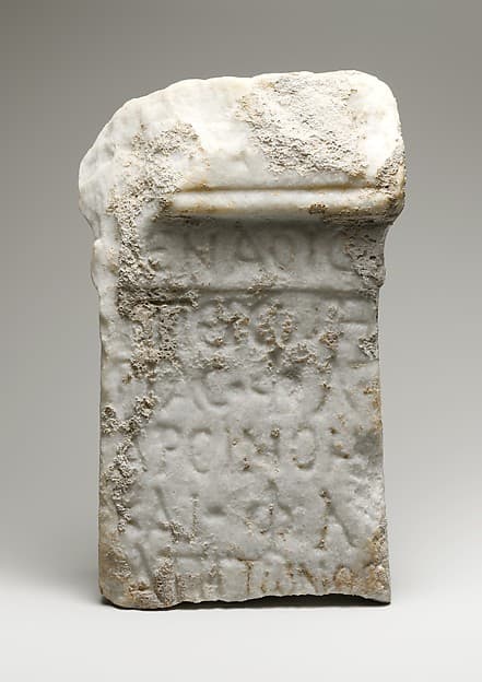Fragmentary marble votive altar
