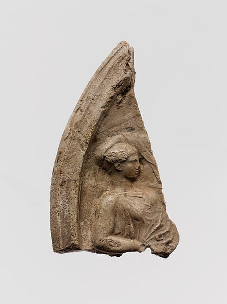 Plaster relief fragment with a reclining woman