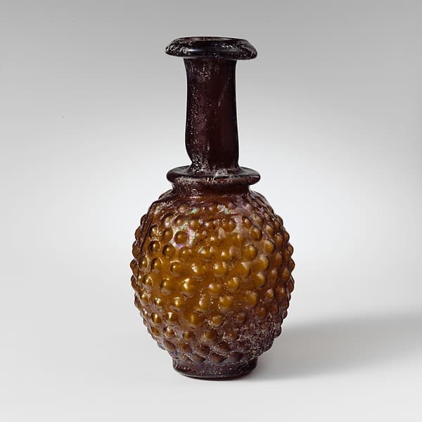 Glass bottle shaped like a bunch of grapes