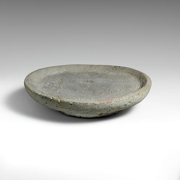 Vesicular basalt mortar or plate