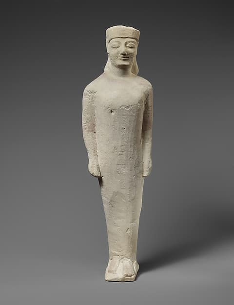 Limestone statuette of a beardless male votary in Greek dress
