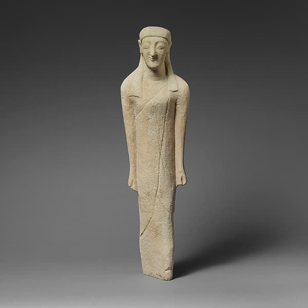 Limestone statuette of a beardless male votary in Greek dress