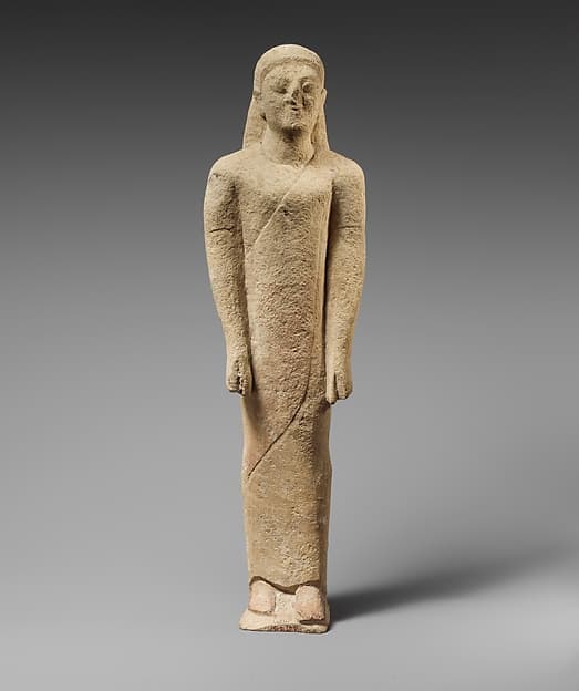 Limestone statuette of a beardless male votary in Greek dress