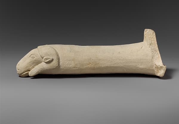 Limestone handle of a patera or a fire shovel ending in a ram’s head