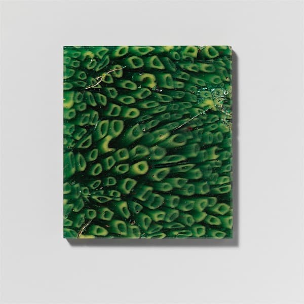 Glass revetment plaque fragment