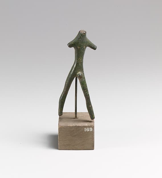 Statuette of a striding man