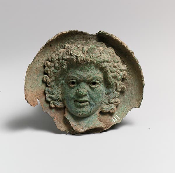 Silvered bronze roundel with satyr head (one of a pair)
