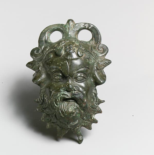 Bronze situla (pail) attachment in the form of a Silenos head