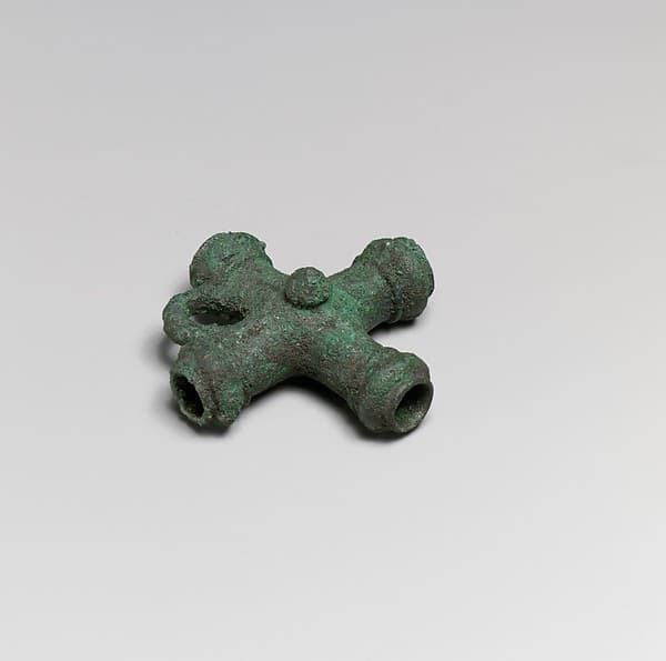 Fragments of a cart or chariot, crossed cylinders