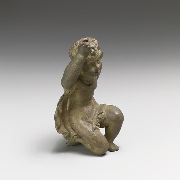 Bronze statuette of Eros kneeling