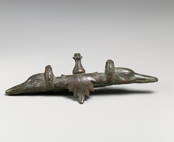 Bronze handle attachment with duck heads