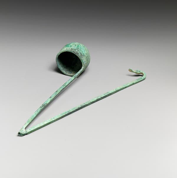Bronze kyathos (ladle) terminating in a duck's head