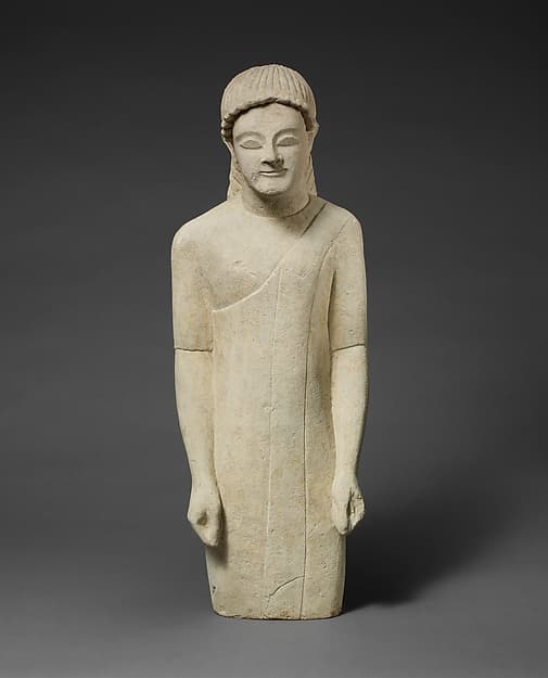Limestone statuette of a beardless male votary in Greek dress