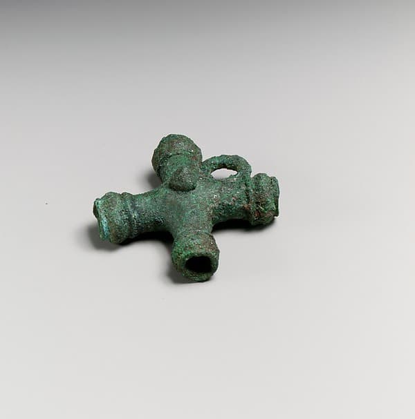Fragments of a cart or chariot, crossed cylinders