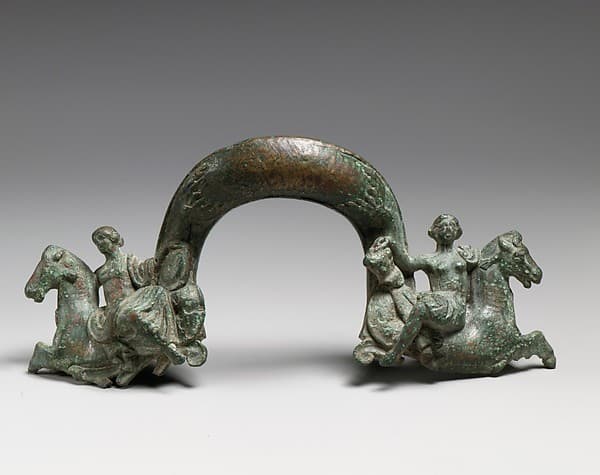 Bronze handle of a shallow basin