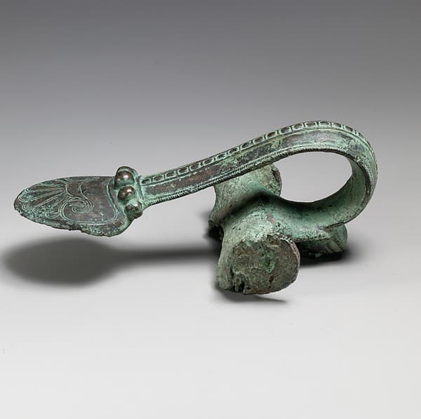 Bronze handle of an oinochoe (jug)