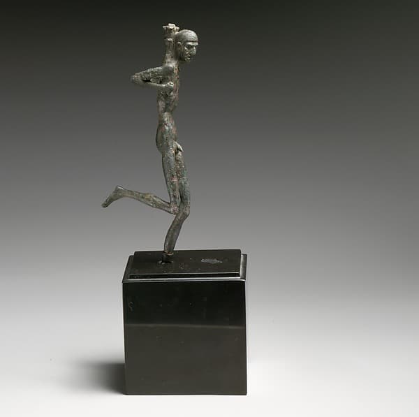Bronze statuette of a runner