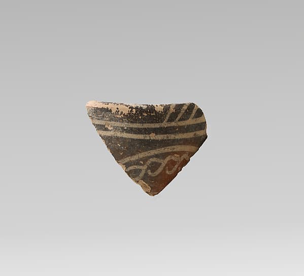 Terracotta rim fragment with quirks and bands