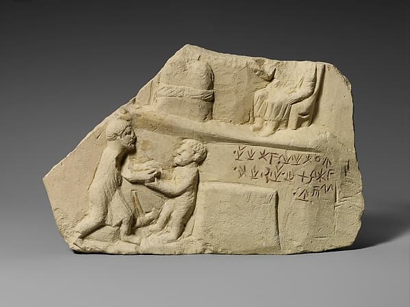 Limestone votive relief