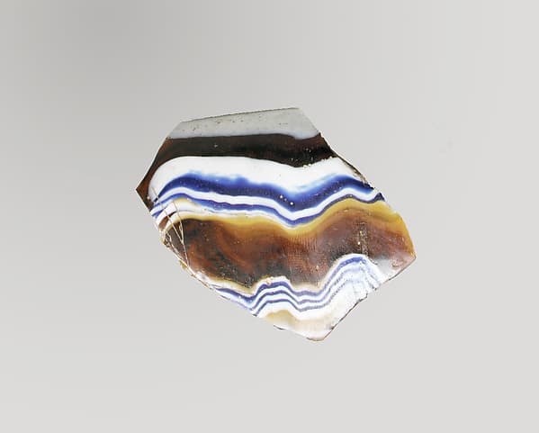 Glass mosaic ribbed bowl fragment